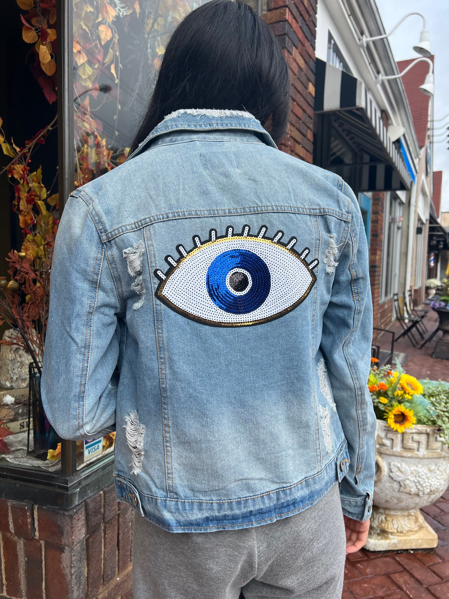 Distressed Medium Wash Blue Metaphysical Denim Jacket With Evil Eye