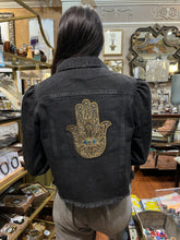 Load image into Gallery viewer, Black Metaphysical Denim Jacket With Gold Hamsa
